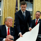 Accused domestic abuser Rob Porter (middle) with accused sexual harasser. Image via the AP.